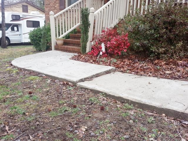 Sidewalk repair in front of home - before