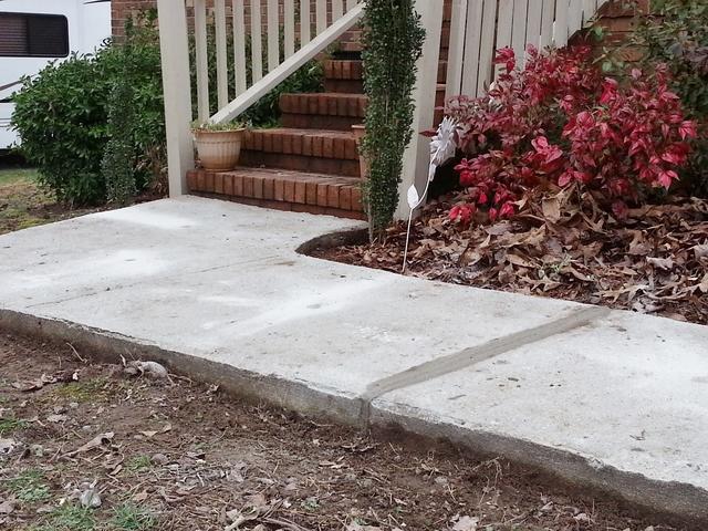 Sidewalk repair in front of home -after
