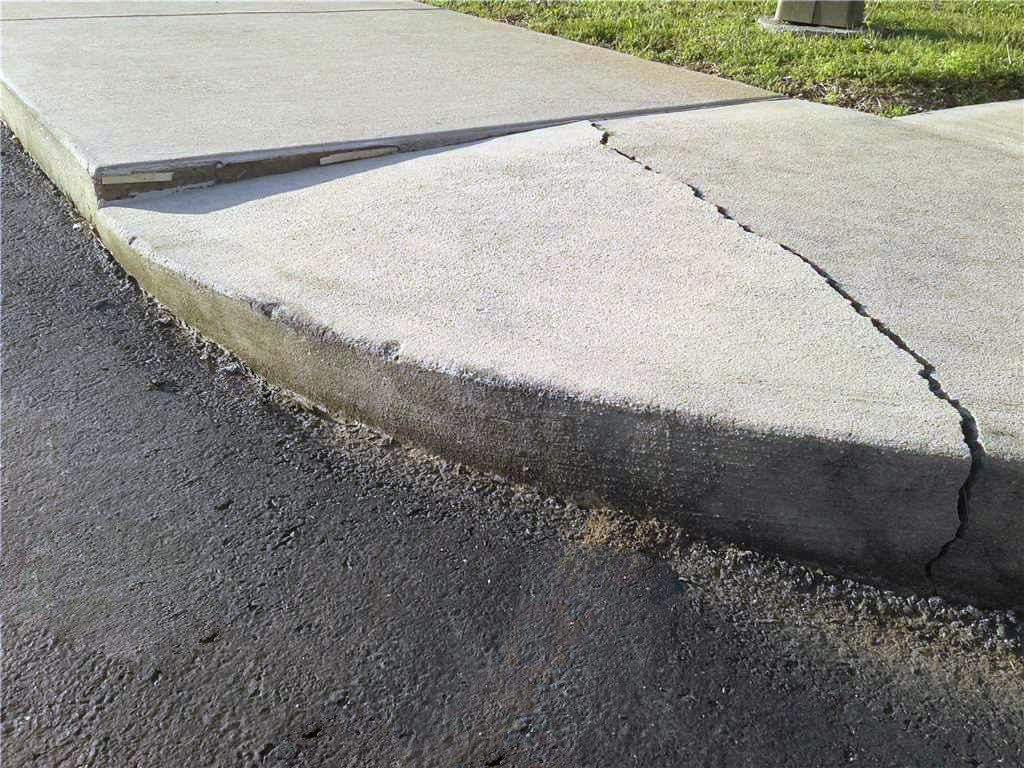 cracked sidewalk - before