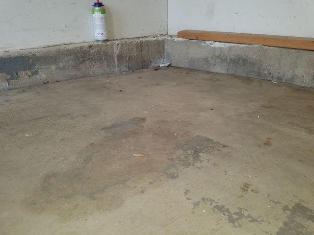 Sunken corner of garage - before